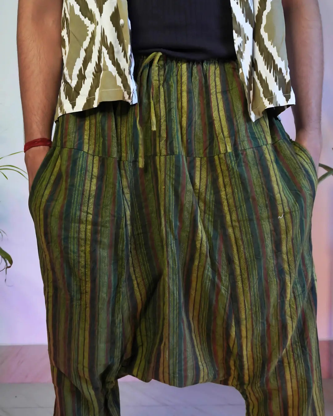 Fabric texture of Bohévo’s Jungle Nomad Green Harem Pants