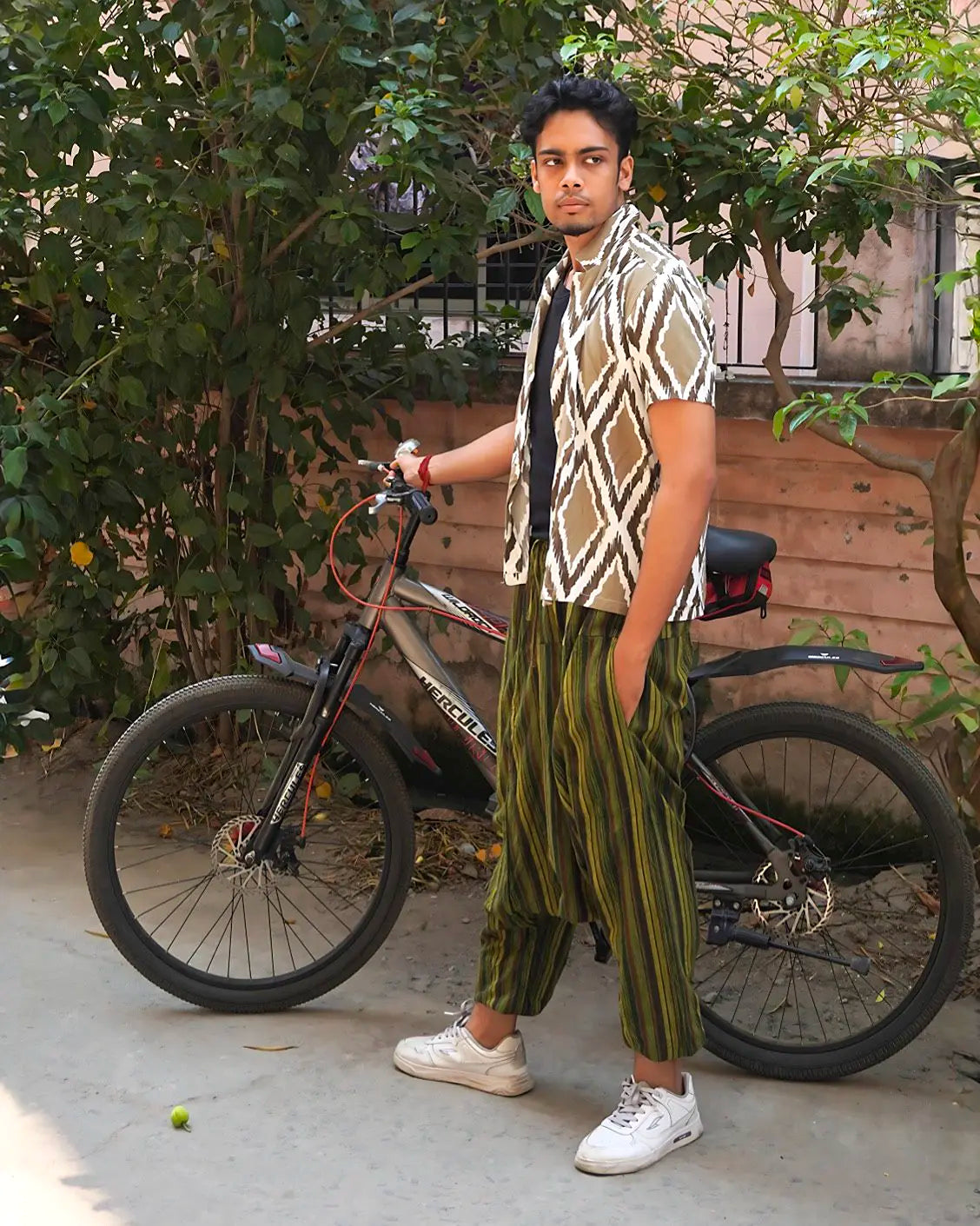 Model wearing Jungle Nomad Green Harem Pants in Outdoor