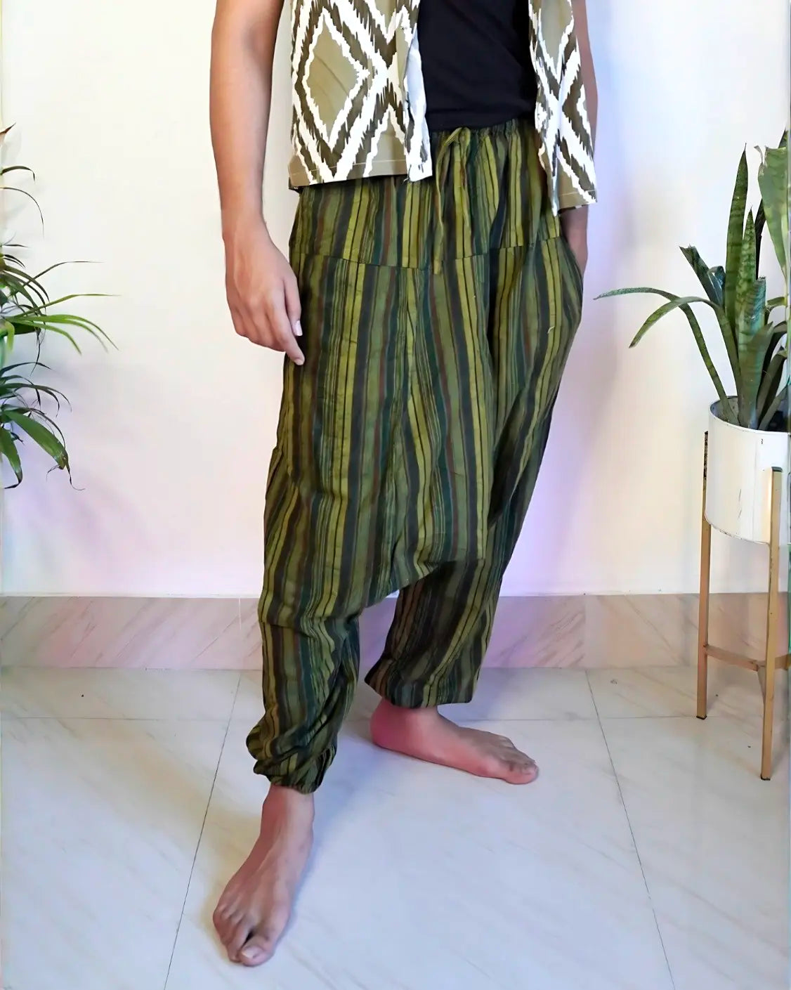 Side profile of eco-friendly green harem pants in Jungle Nomad style