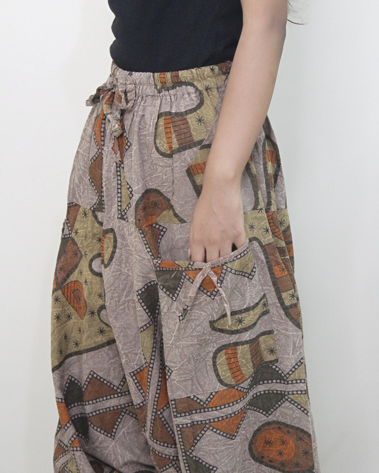 Patterned harem pants with a neutral background