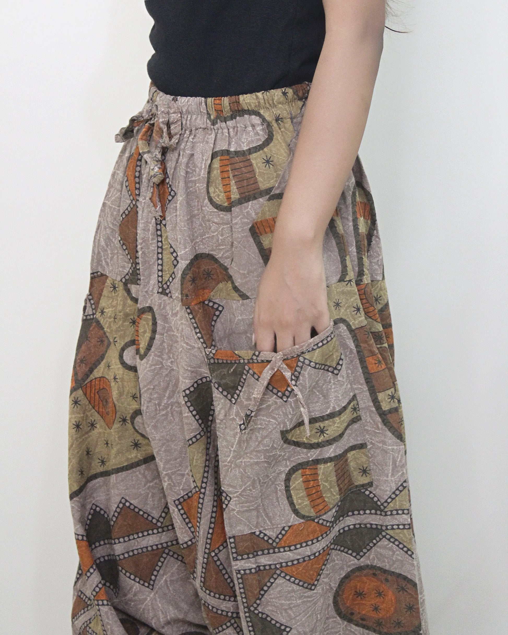 Patterned harem pants with a neutral background