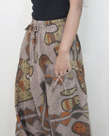 Patterned harem pants with a neutral background